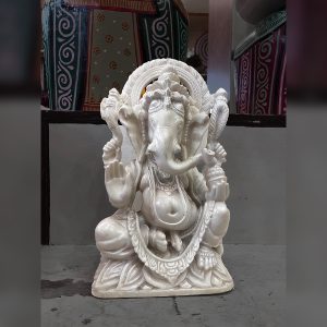 Lord Ganesha sitting marble stone statue